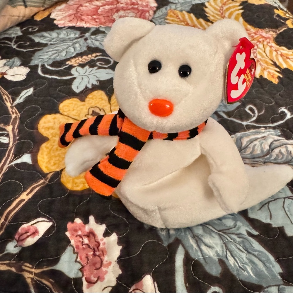 White Plush beanie baby ghost with Orange and Black Scarf. Quivers
